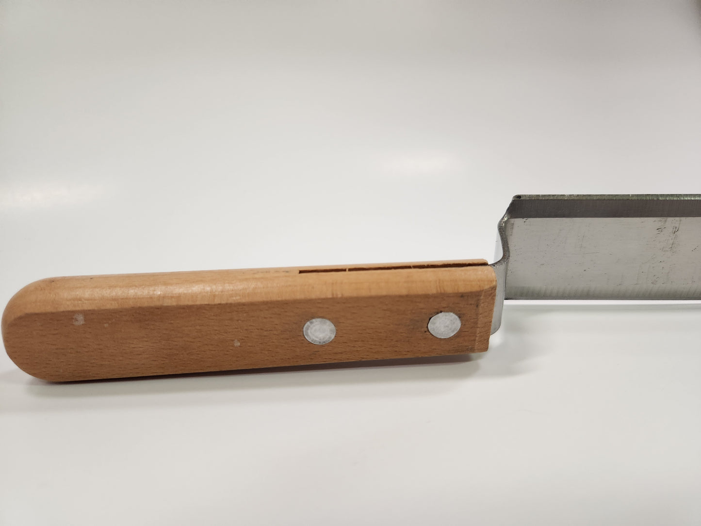 Uncapping Knife