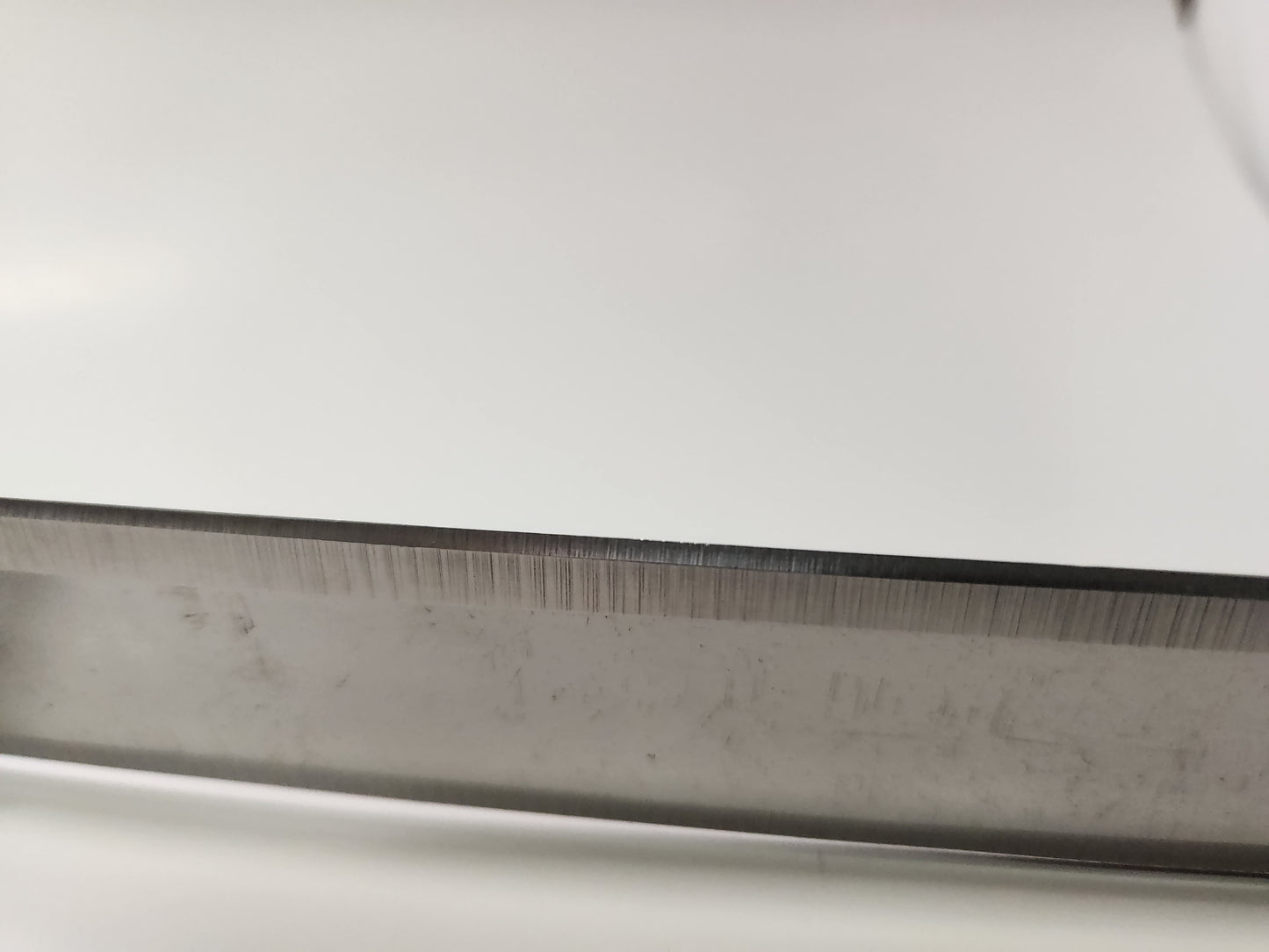 Uncapping Knife